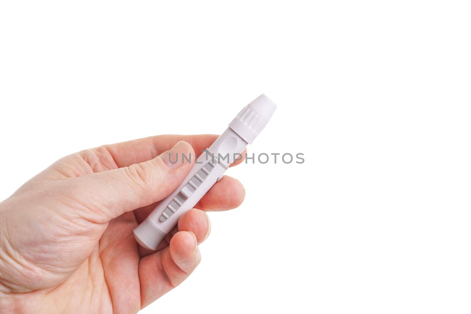 Hand holding lancing for blood glucose test, isolated on white
