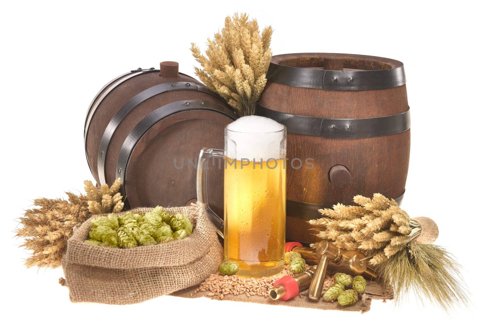Beer glass and two beer barrels with wheat,barley,hops,malt insulated on white
