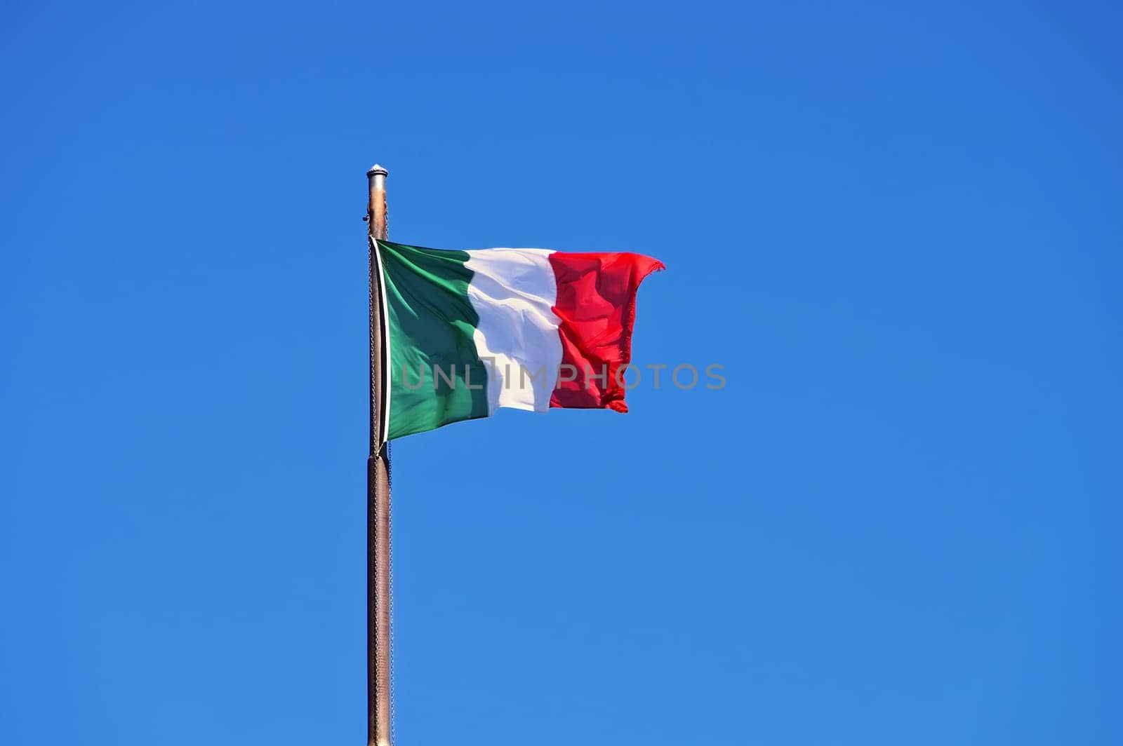 Italy flag and blue sky- italian flag and blue sky