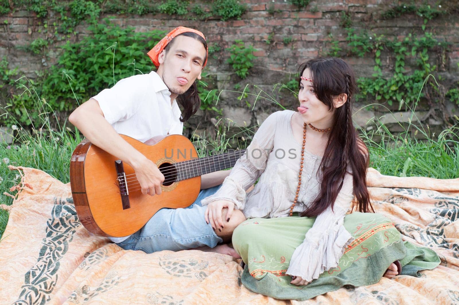 guitarist and his girlfriend in a beautiful day