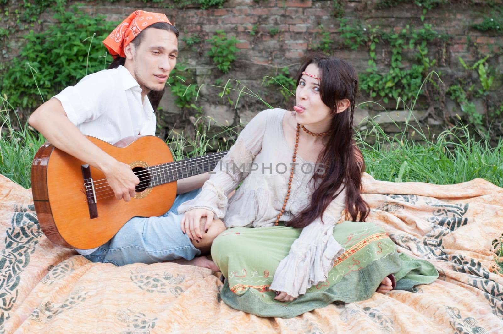 guitarist and his girlfriend in a beautiful day