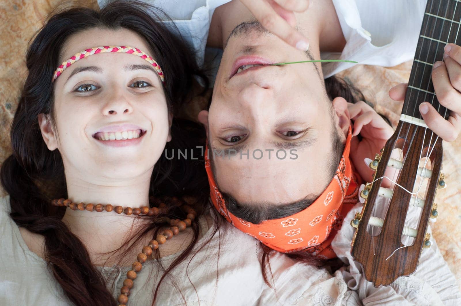 girl and boy hippies in a beautiful background
