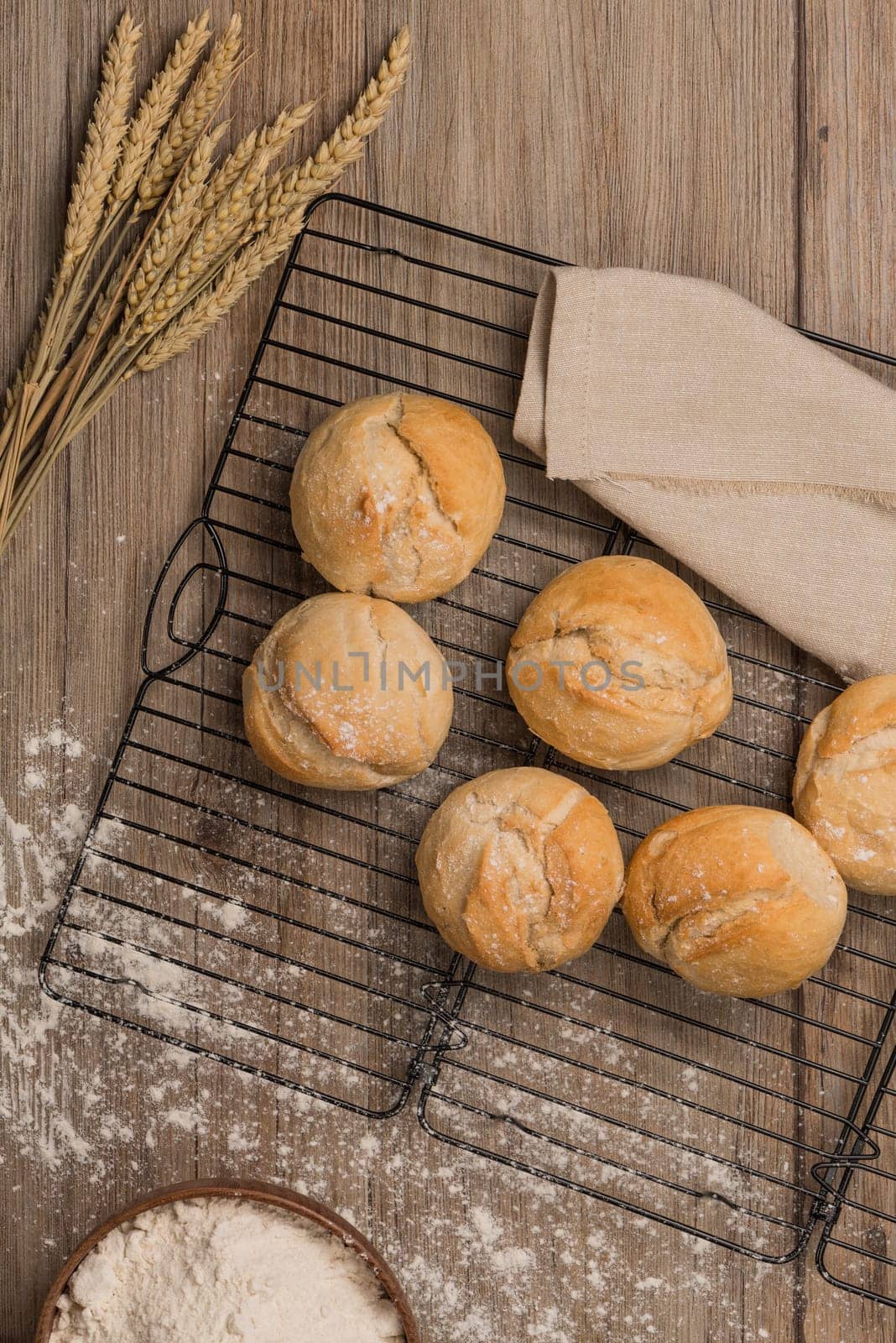 Freshly baked bread in rustic setting background.