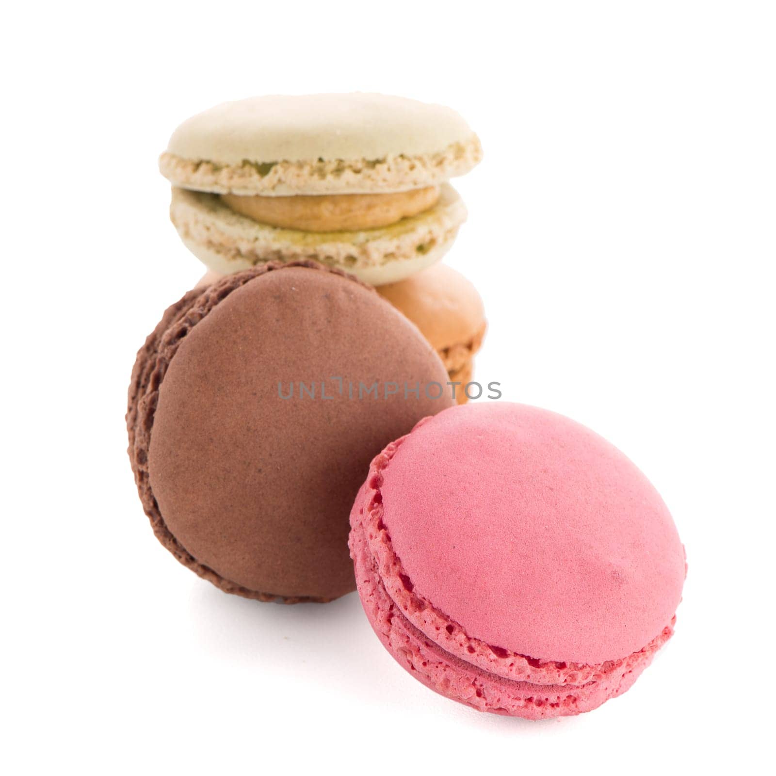 Colorful French Macarons on the white background.