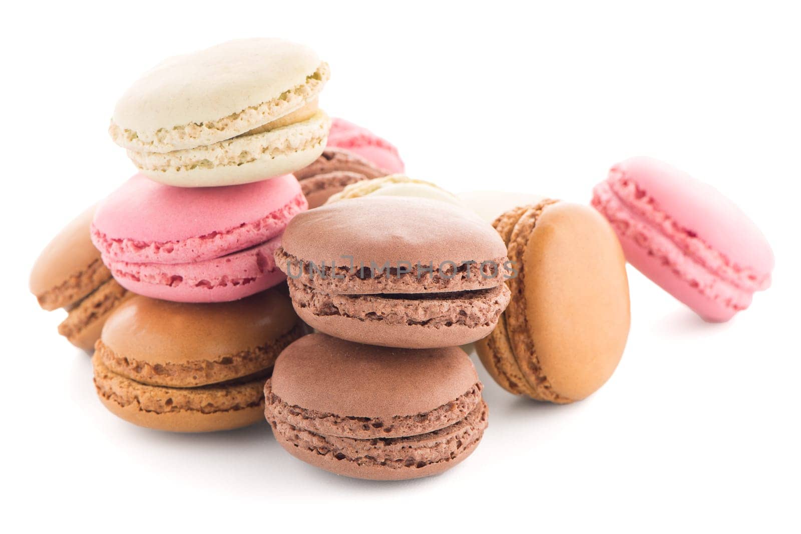 Colorful French Macarons on the white background.