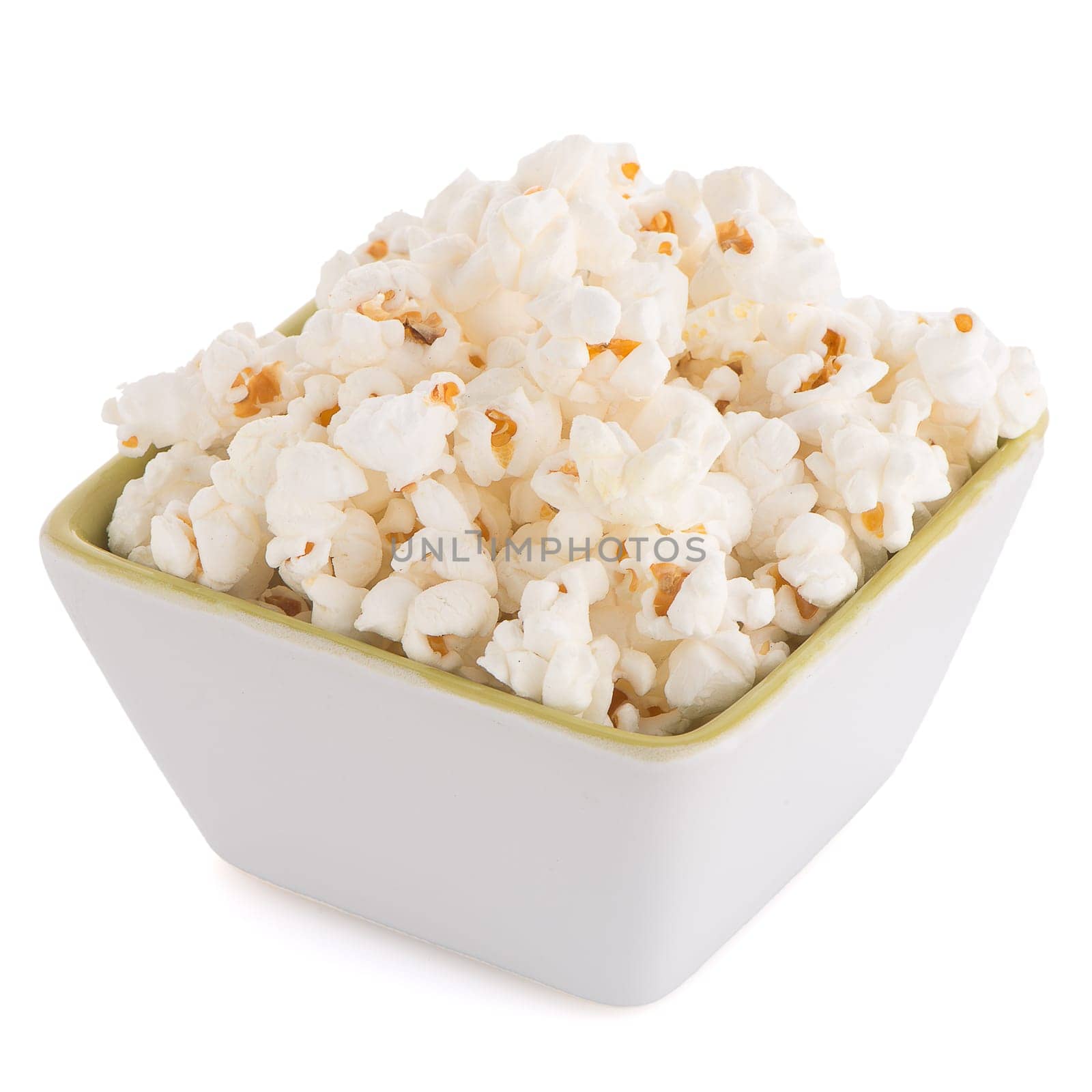 Popcorn in a white bowl on a white background