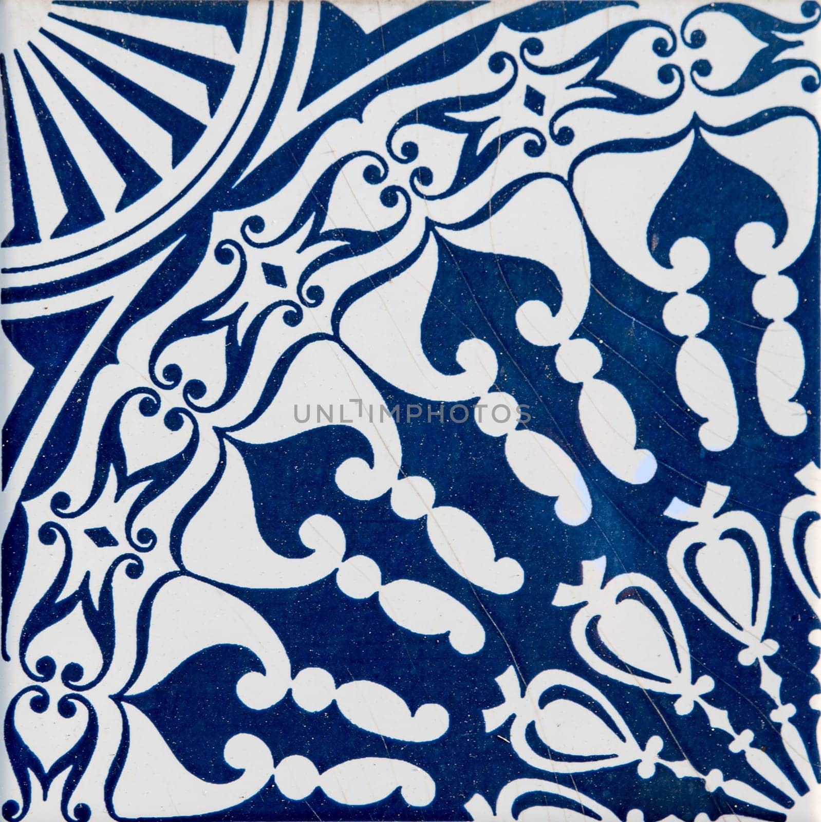 Closeup detail of old Portuguese glazed tiles.