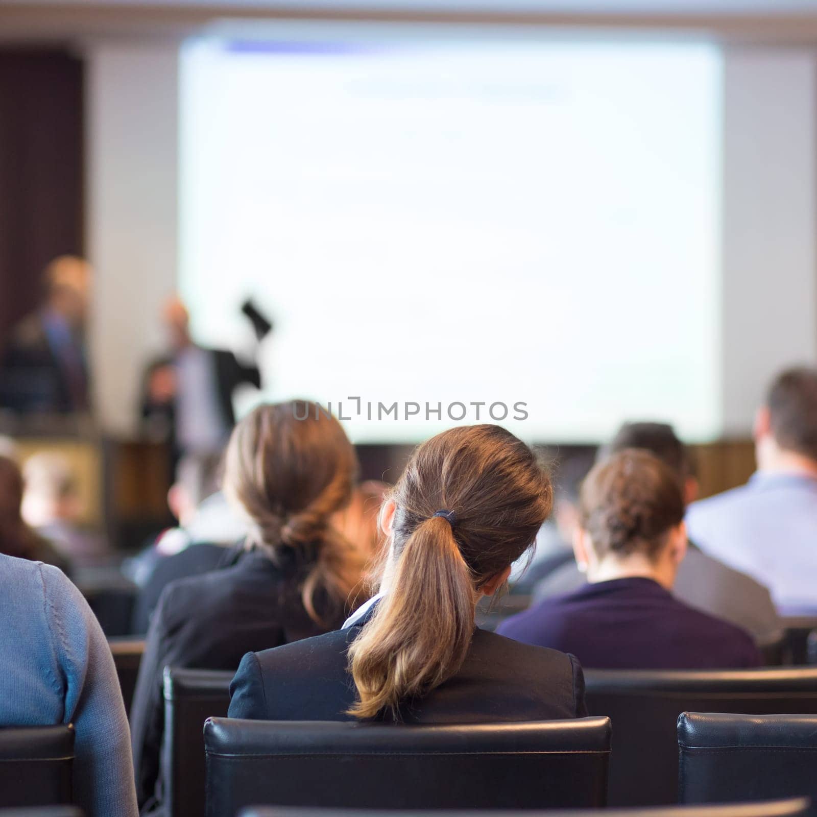Speaker Giving a Talk at Business Meeting. Audience in the conference hall. Business and Entrepreneurship.