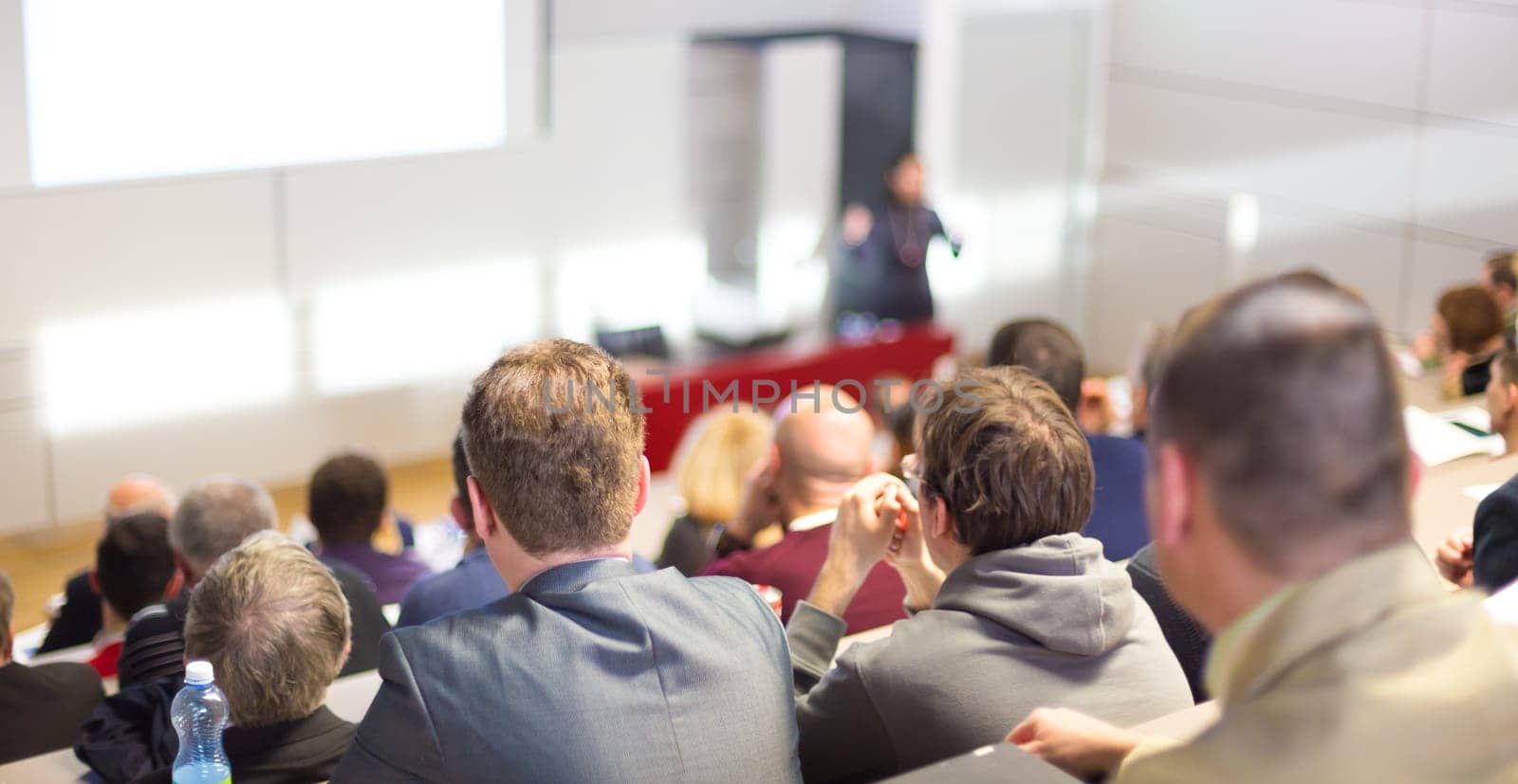 Speaker at Business Conference and Presentation. Audience at the conference hall. Business and Entrepreneurship.