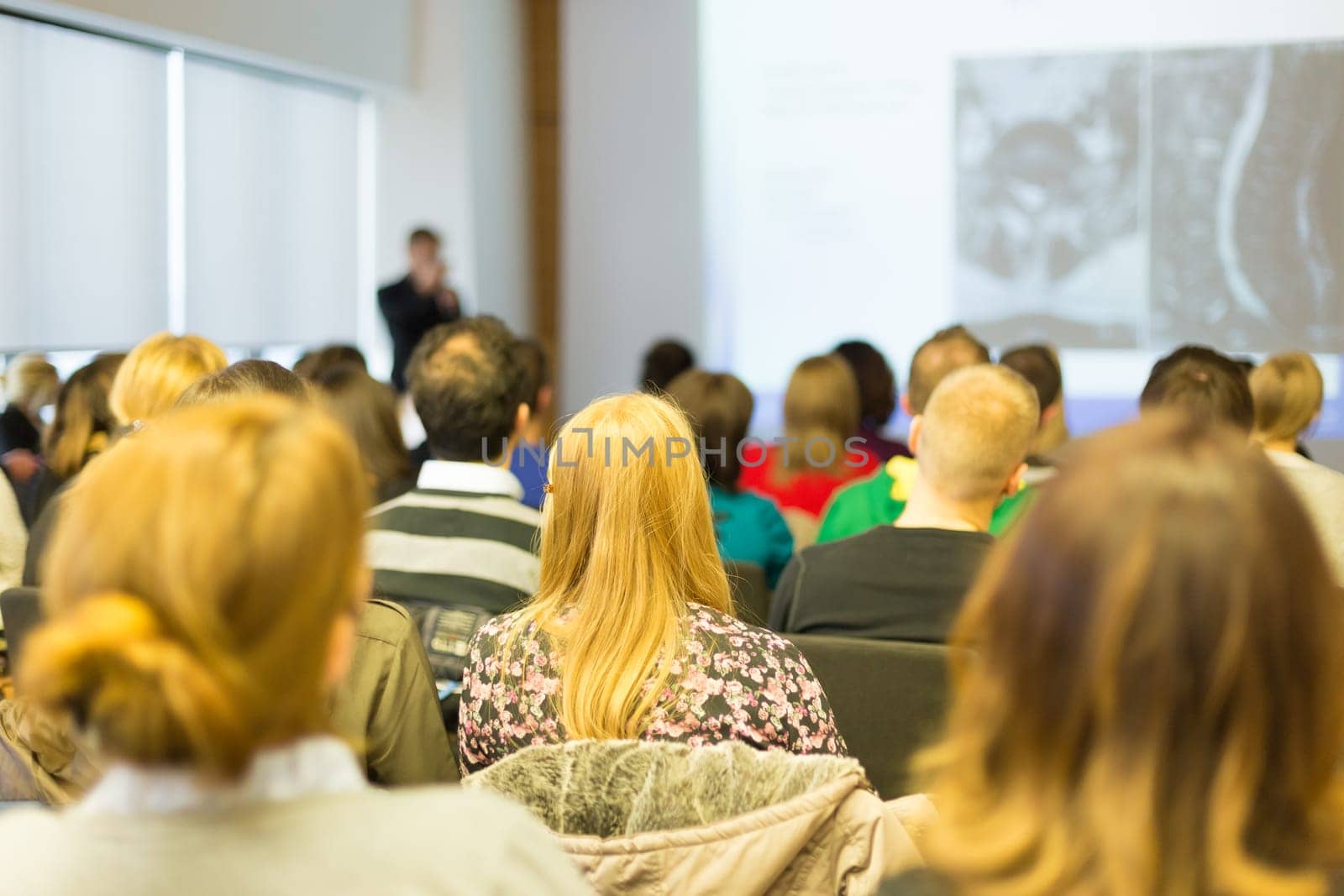 Faculty lecture and workshop. Audience at the lecture hall. Academic education.