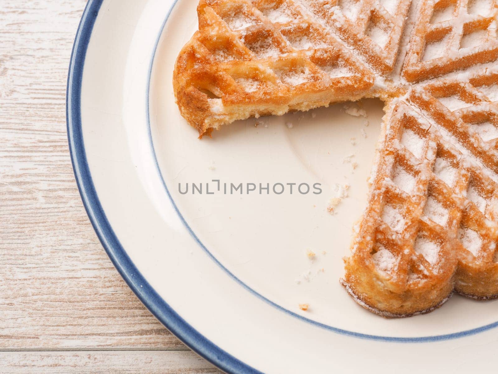Delicious waffle on a rustic plate