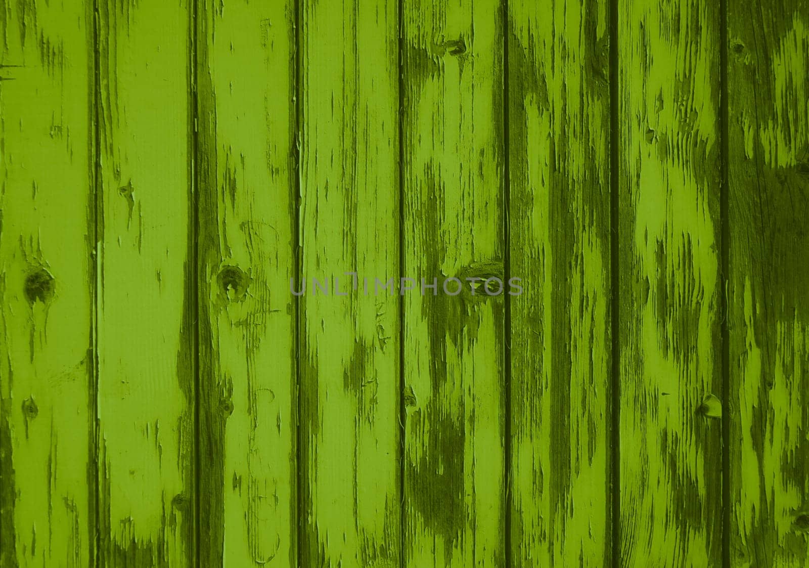 Weathered old light green wooden planks