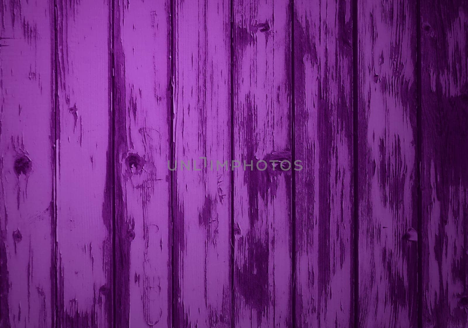Weathered purple board wall as background