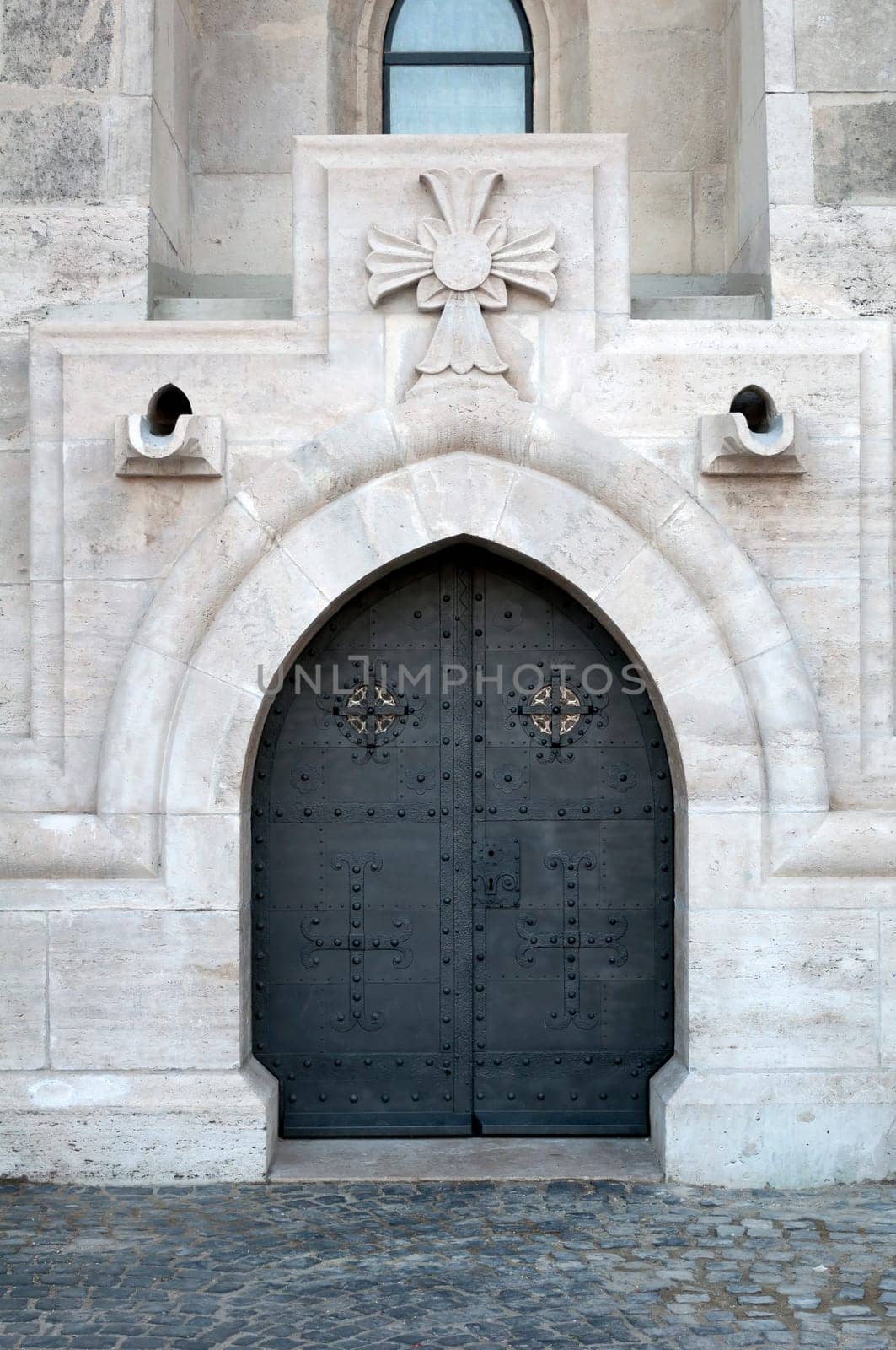 Detailed view of a medieval cathedral door.