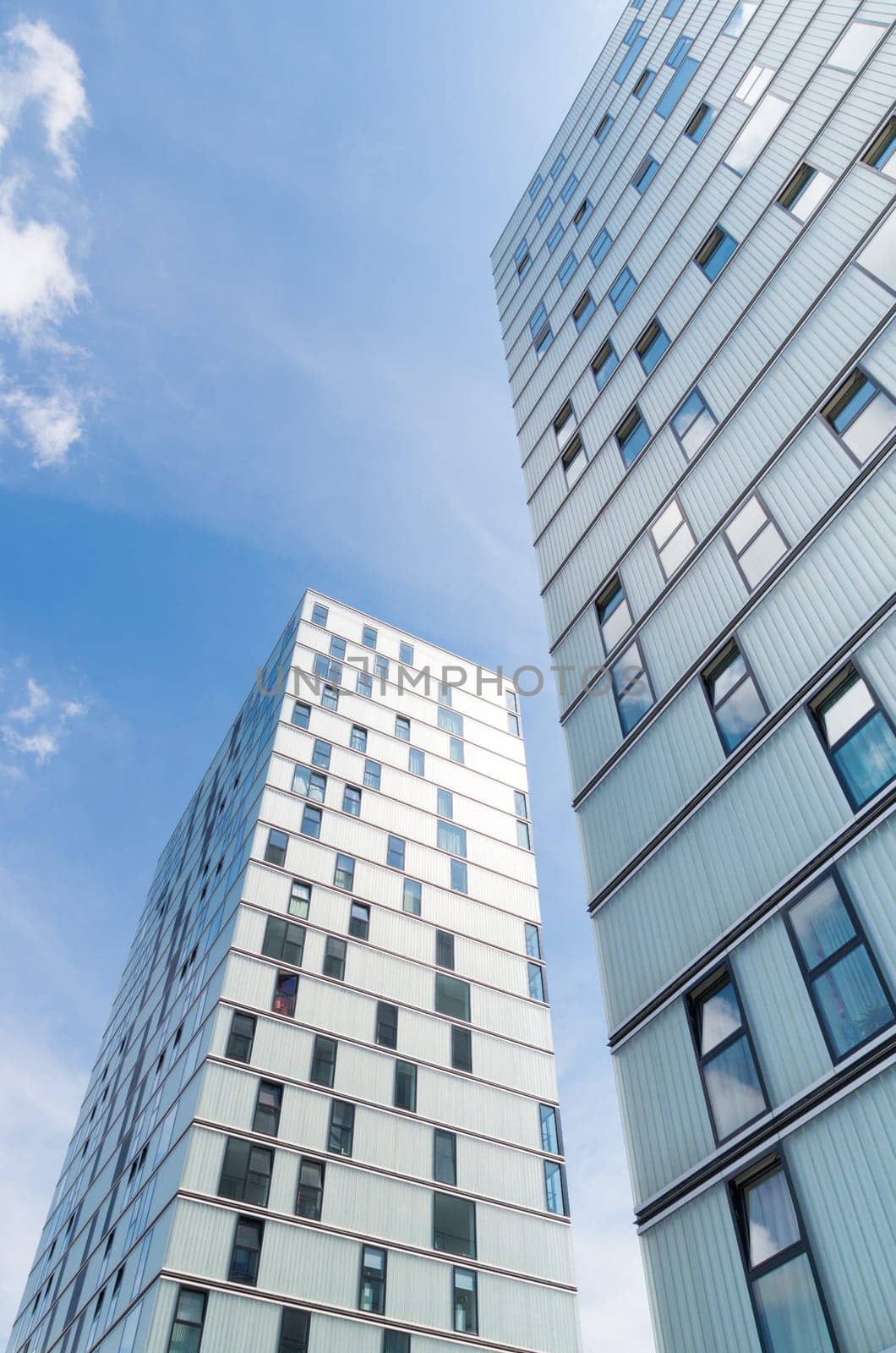 facades of modern office buildings in Almere, netherlands. It is the youngest and fastest growing city in the country, founded around 1975.