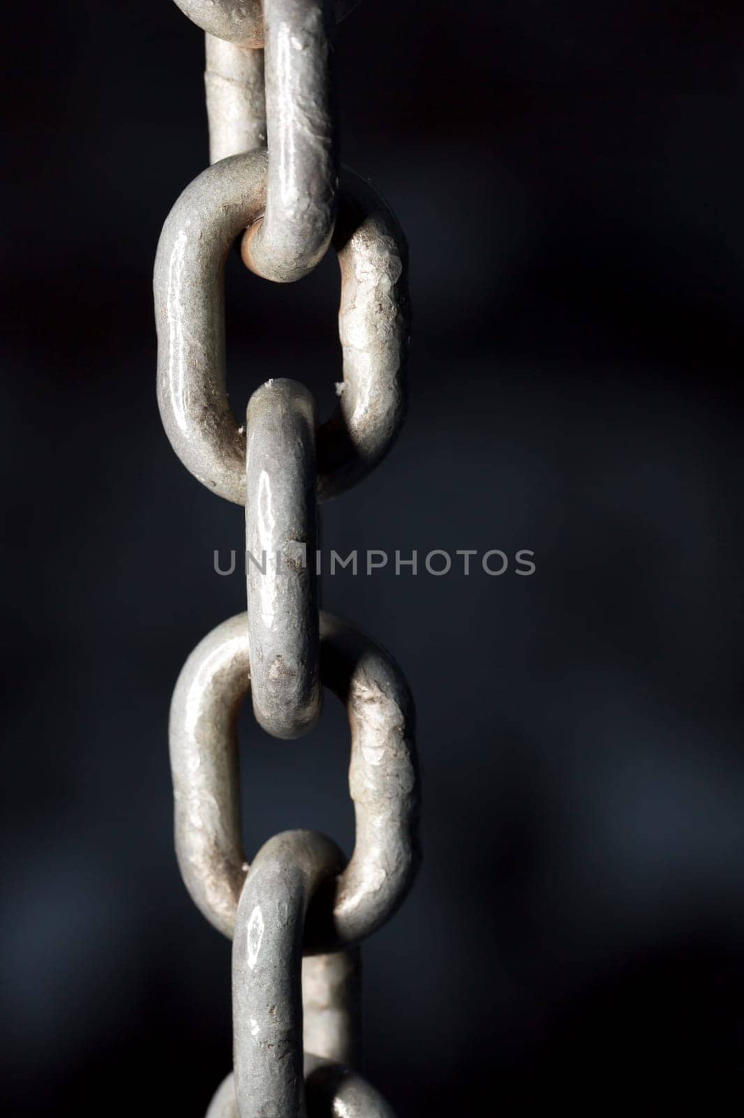 Chain Close Up with a dark background.