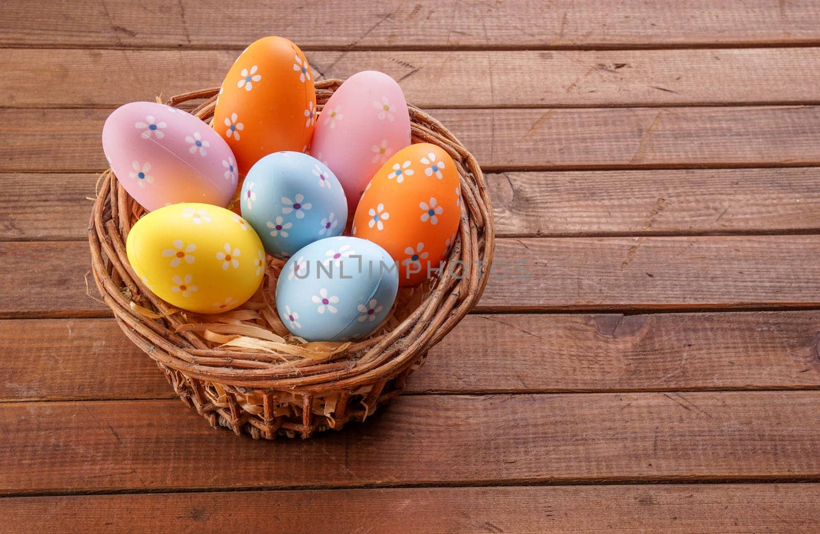 Colorful Easter eggs gathered in a basket
