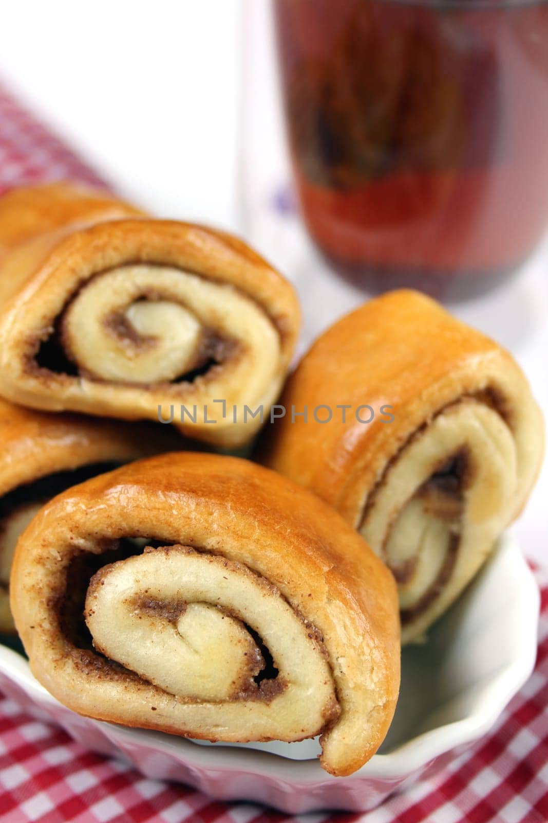 Cinnamon snails with tea glass