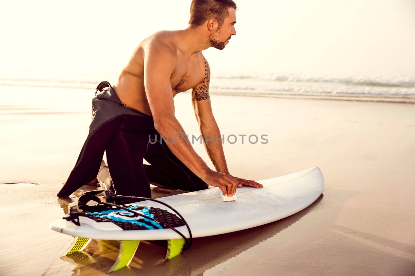 A surfer getting ready for the surf