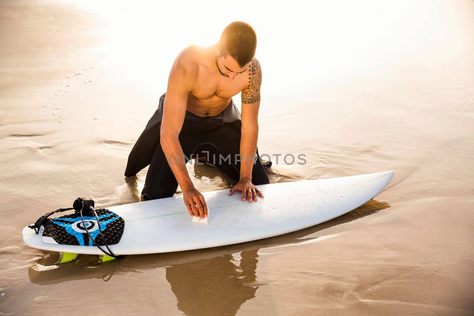 A surfer getting ready for the surf