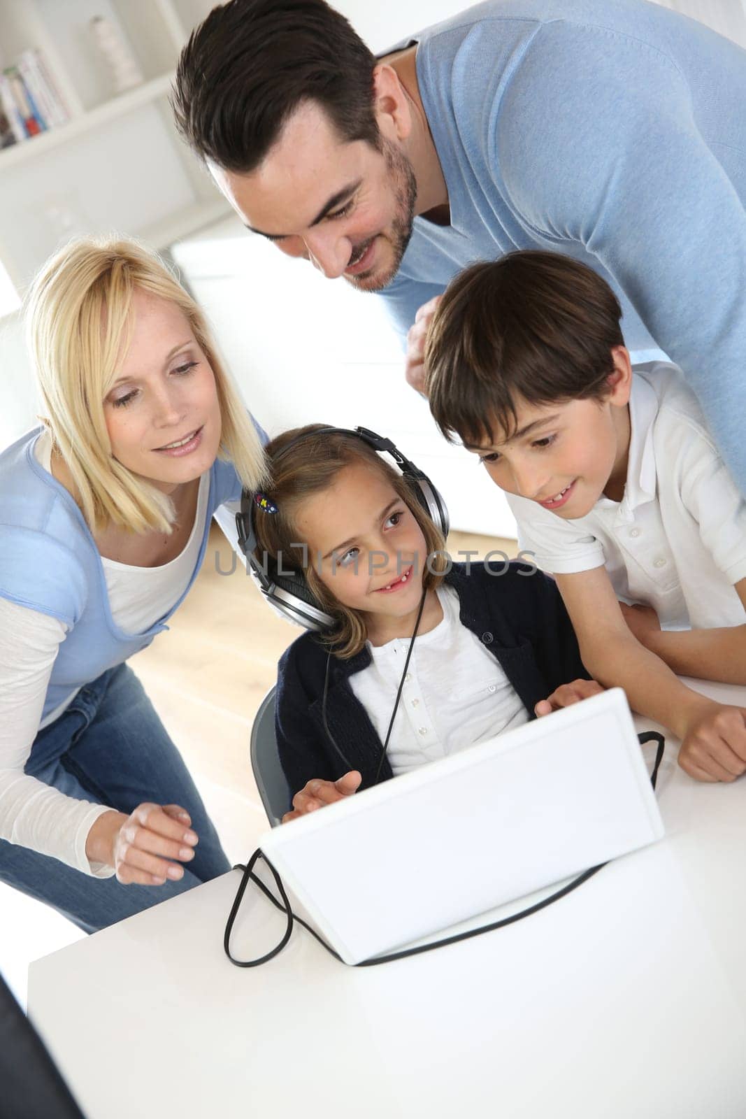 Family using webcamera to communicate with loved ones