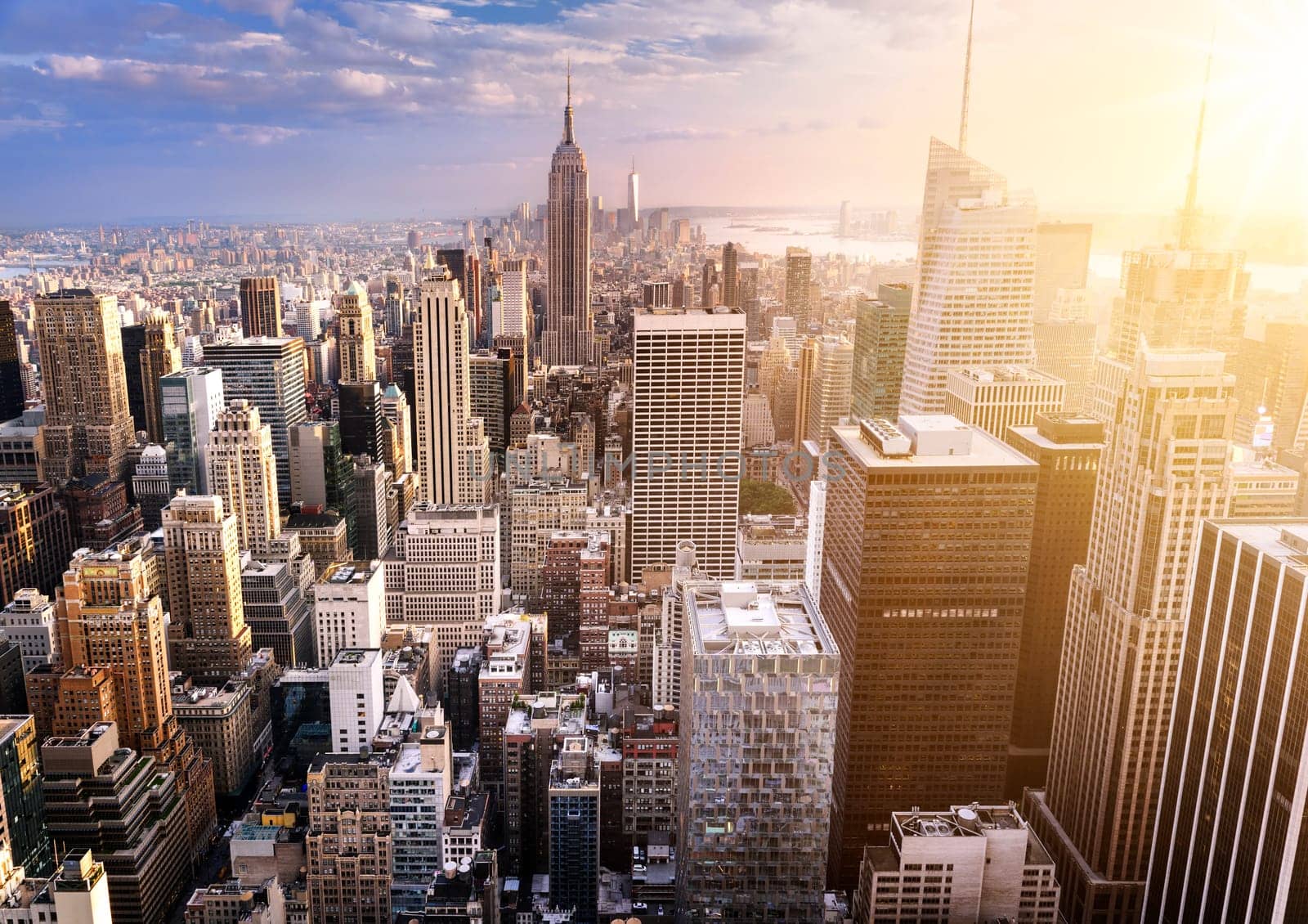 New York City skyline with urban skyscrapers at sunset, USA.