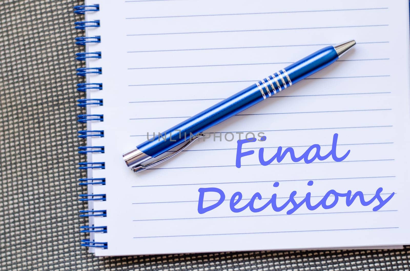 Final decisions text concept write on notebook with pen
