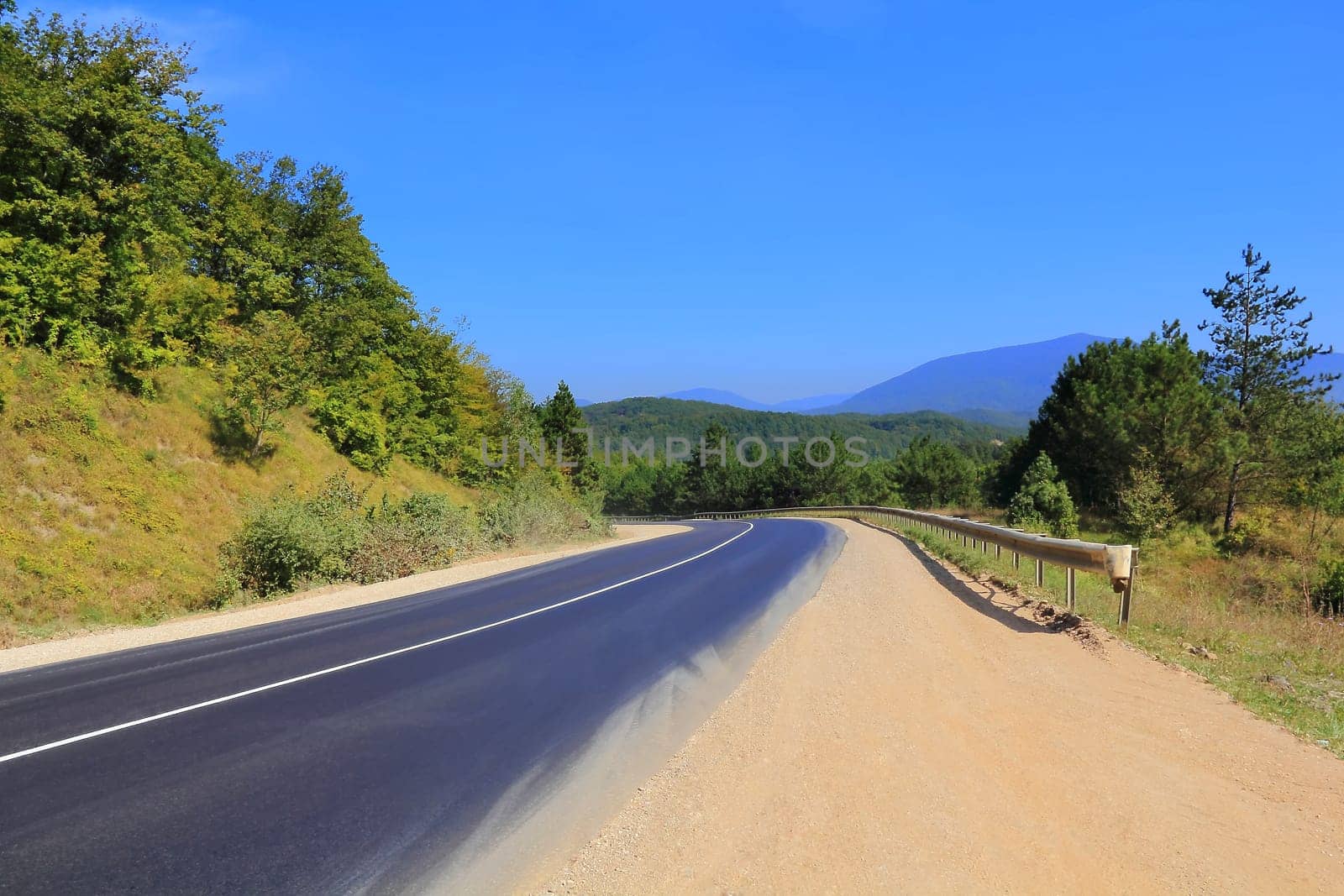 Image of landscape with line of road