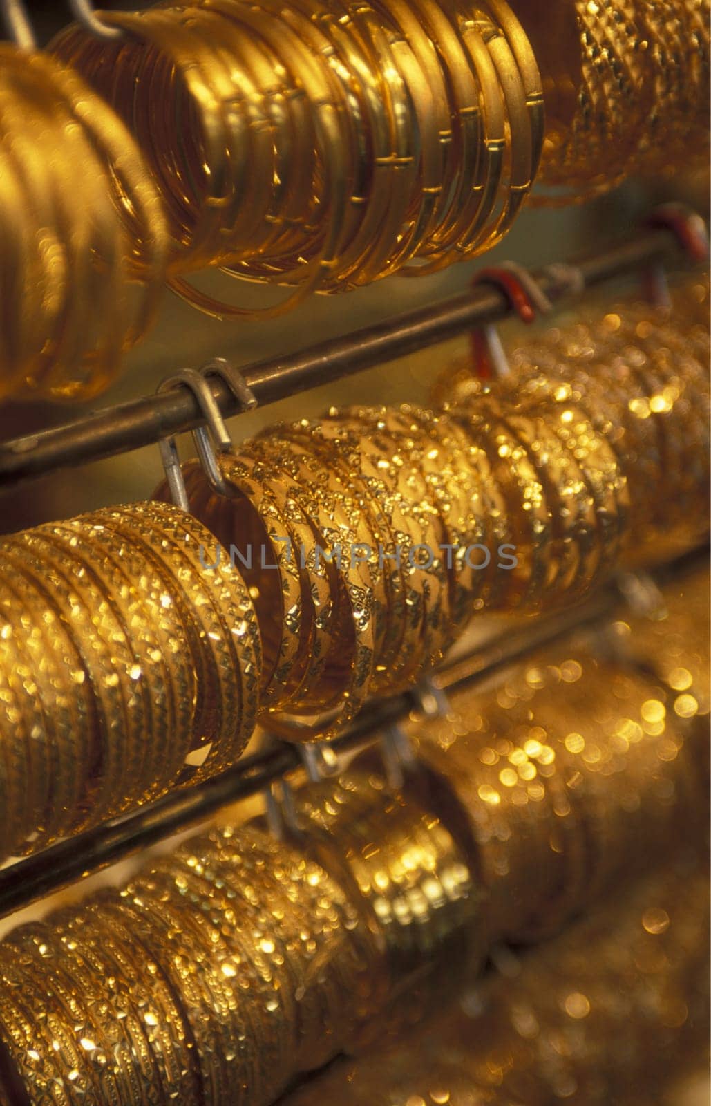 a Gold shop the souq or Market in the old town in the city of Dubai in the Arab Emirates in the Gulf of Arabia.