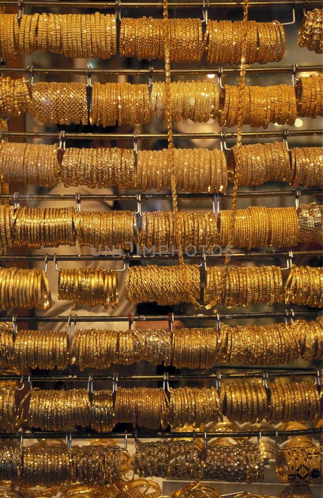 a Gold shop the souq or Market in the old town in the city of Dubai in the Arab Emirates in the Gulf of Arabia.