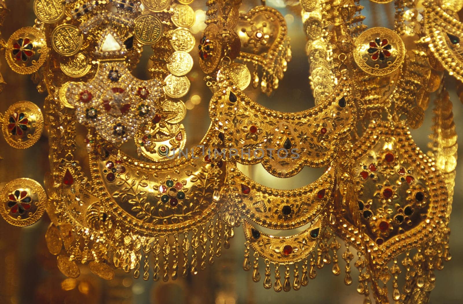 a Gold shop the souq or Market in the old town in the city of Dubai in the Arab Emirates in the Gulf of Arabia.