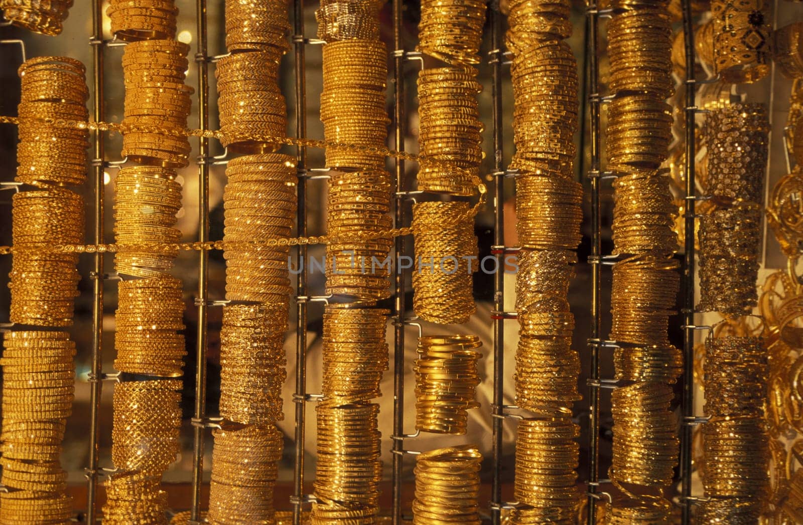 a Gold shop the souq or Market in the old town in the city of Dubai in the Arab Emirates in the Gulf of Arabia.