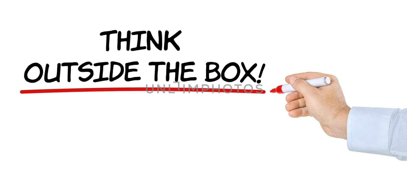 Hand with pen writes Think outside the box