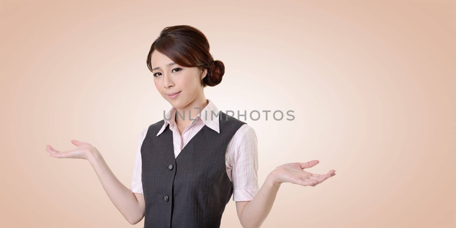 Helpless young business woman shrugs her shoulders. closeup portrait with clipping path.