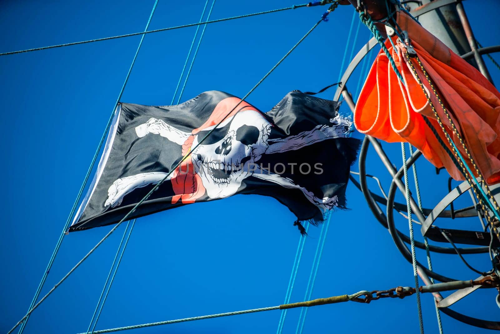 Pirate flag on the sailing ship.