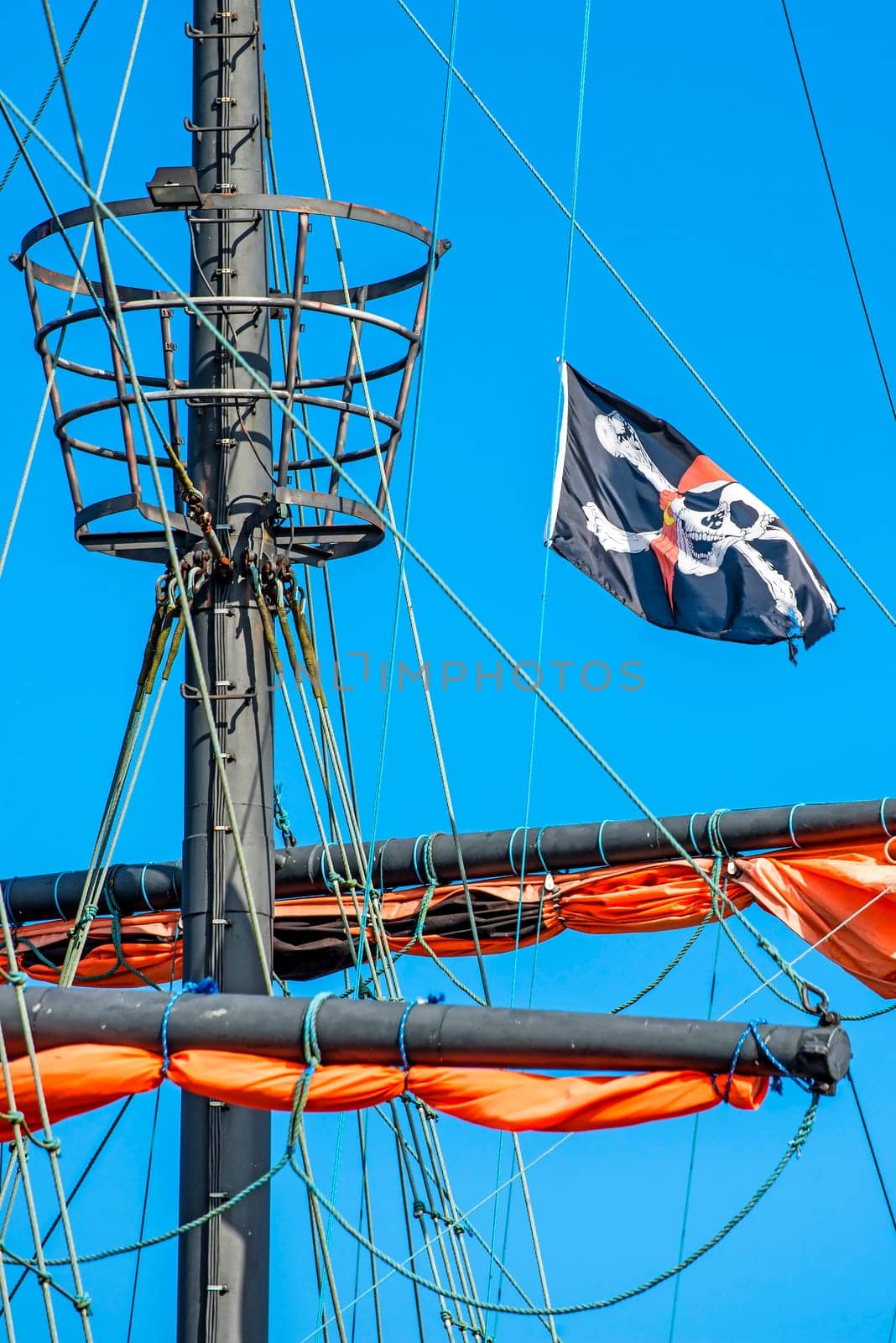 Pirate flag on the sailing ship.