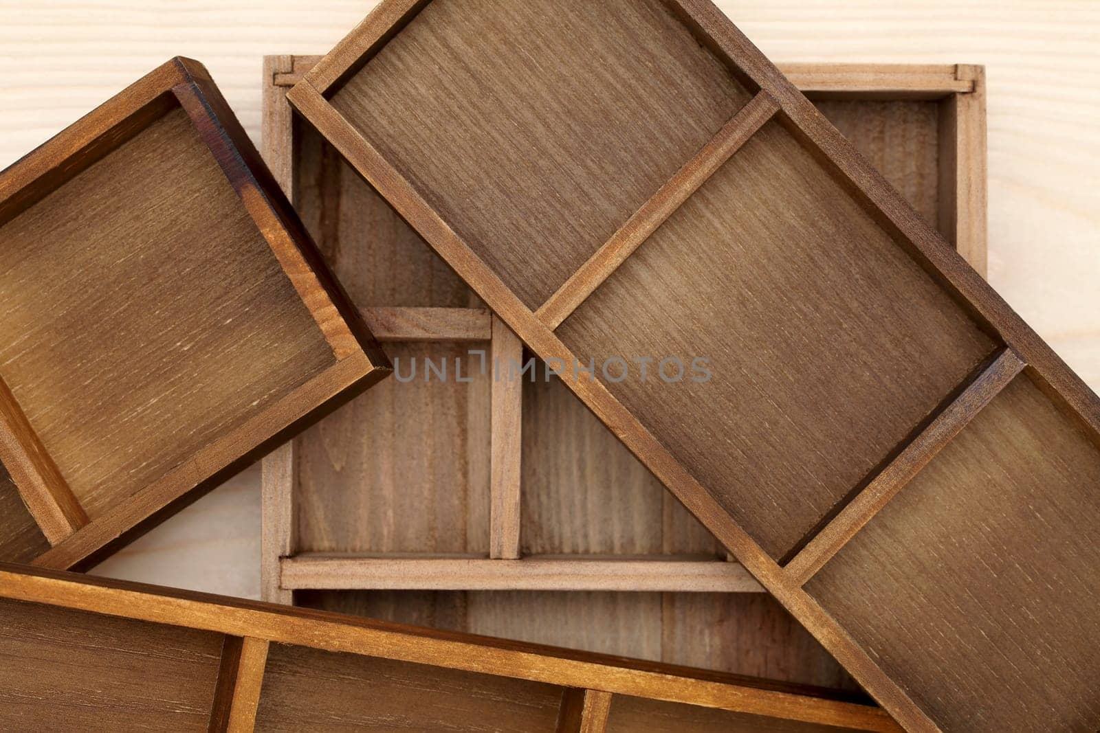 Stack of empty wooden box on wood background