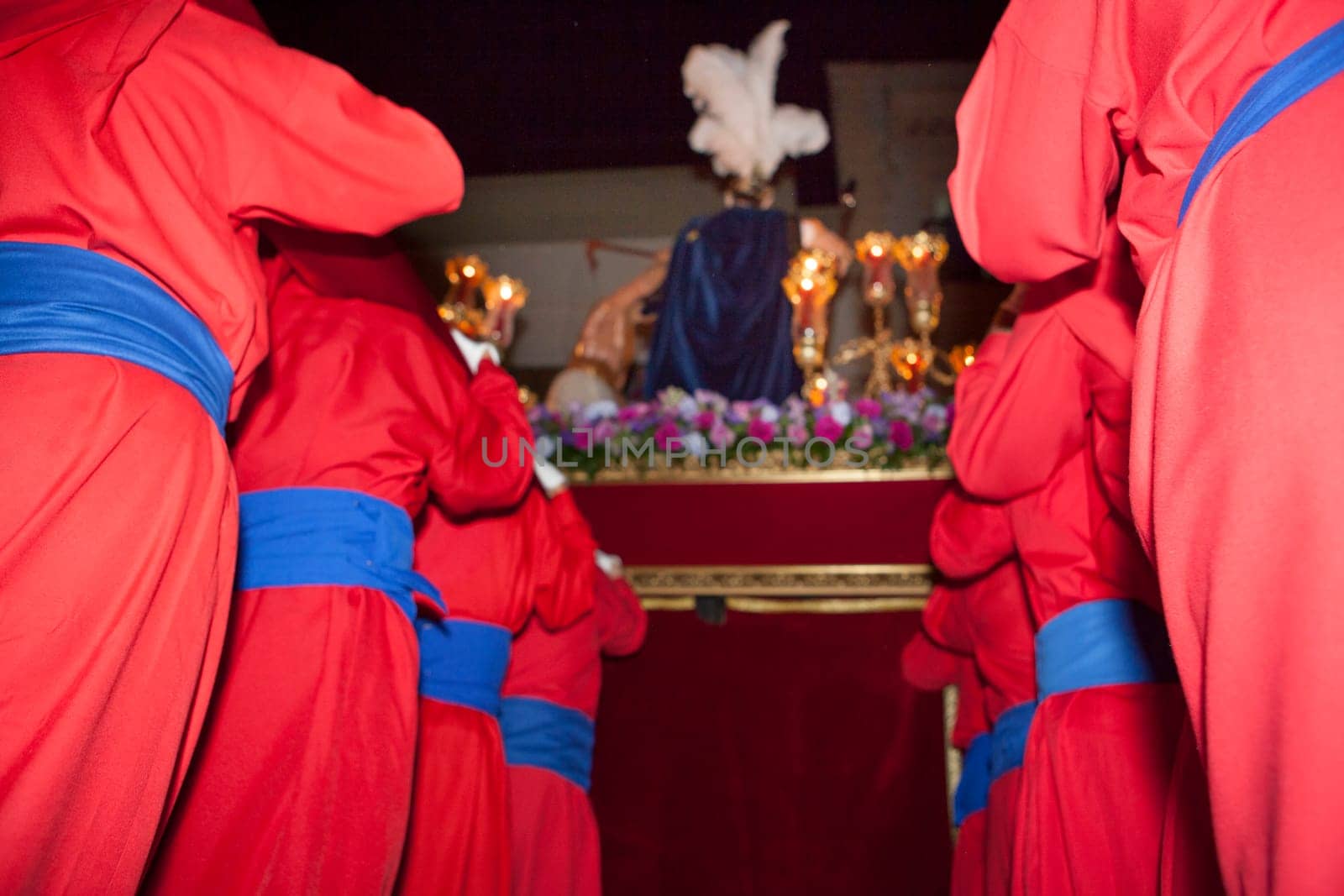 Costaleros carriying a float during the Holy Week Procession, Spain