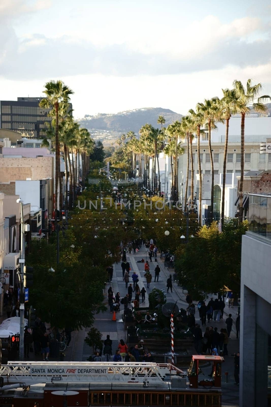 Santa Monica,United States - December 28,2015: The palm-fringed shopping street,third street,with visitors and pedestrians and a firefighting operation on December 28,2015 in Santa Monica.