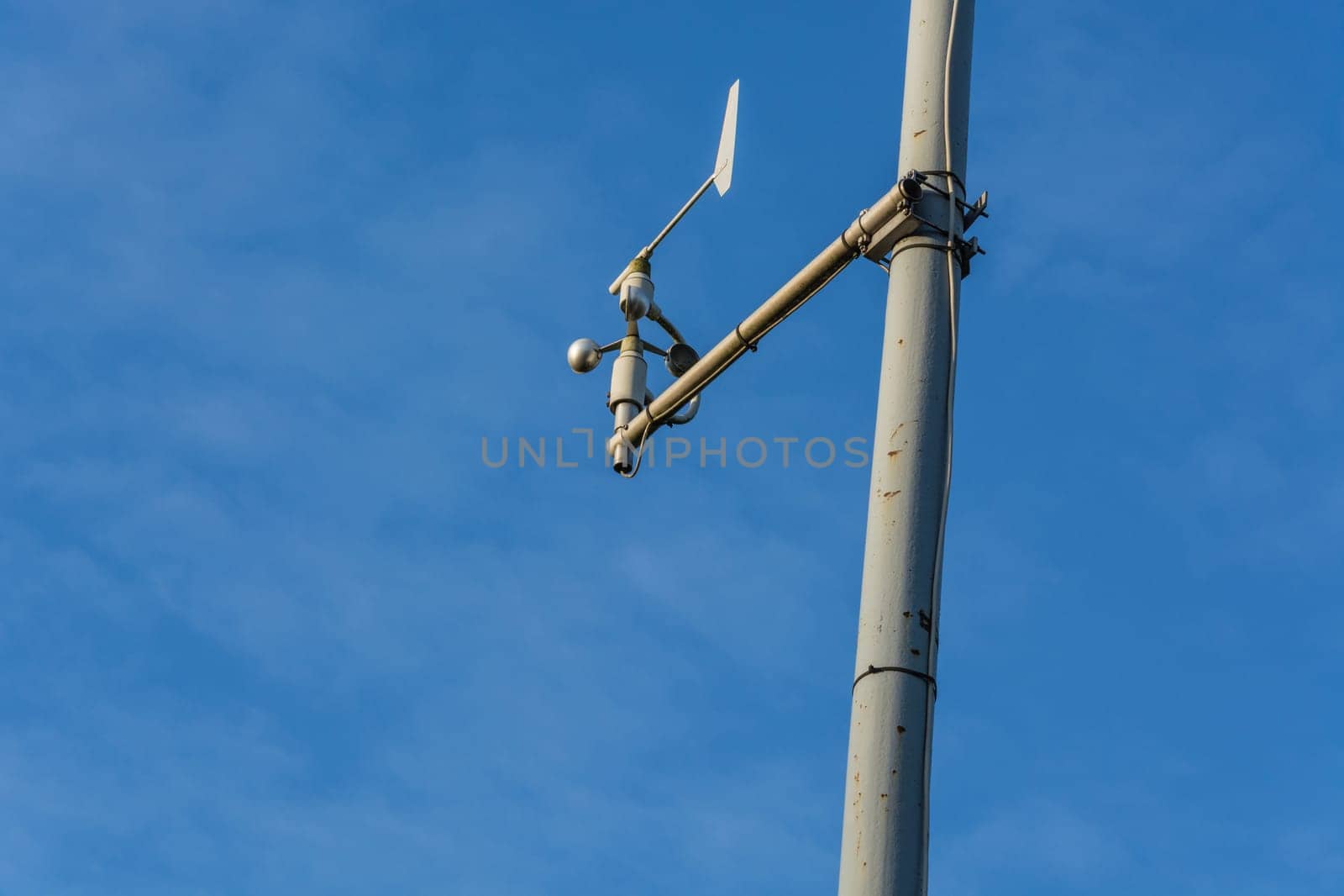 Weather station with anemometer on blue sky... Weather station with anemometer on blue sky.