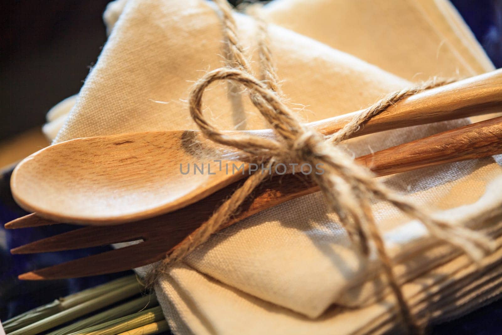 The Wooden spoon and fork on table