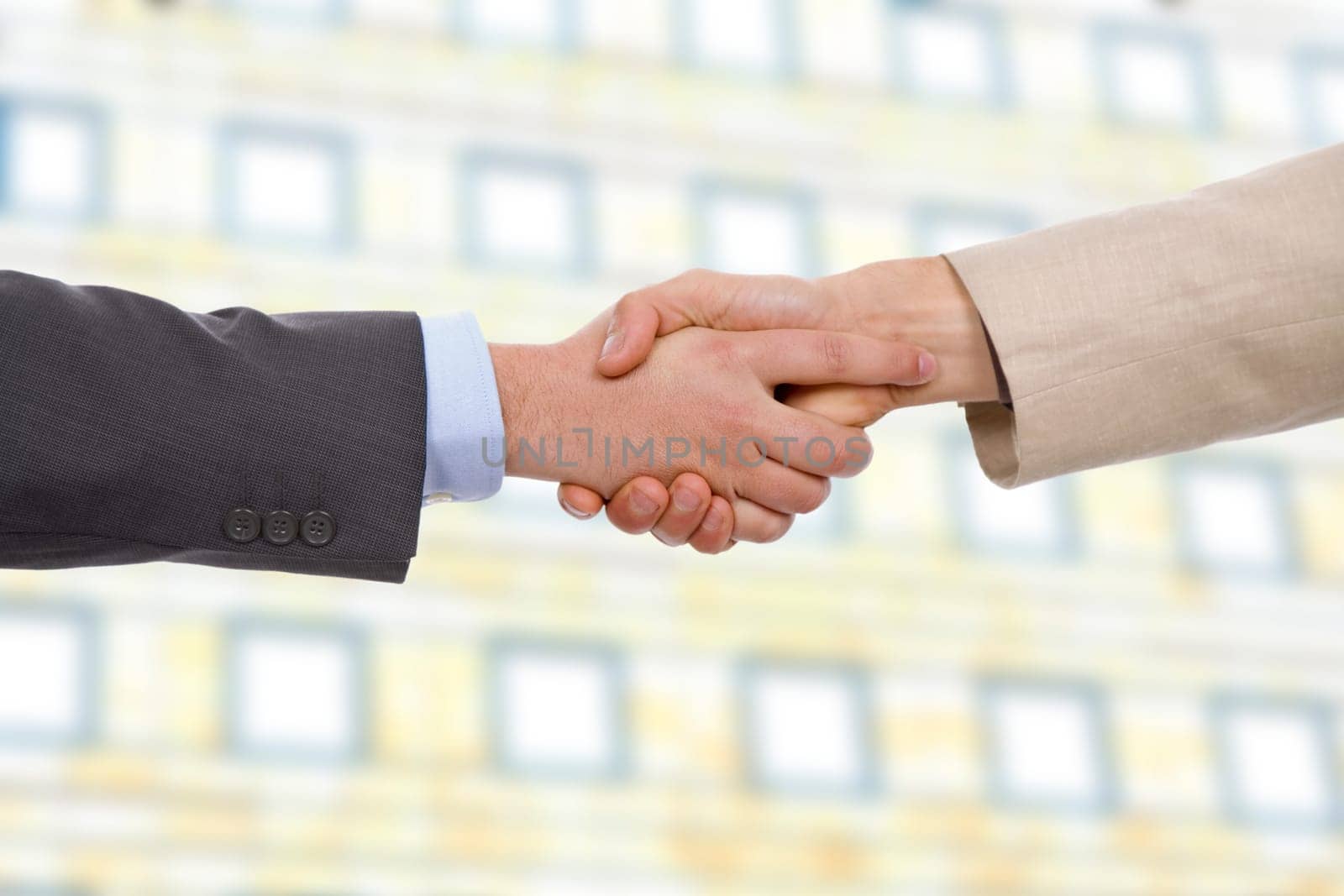 Business men hand shake at the office