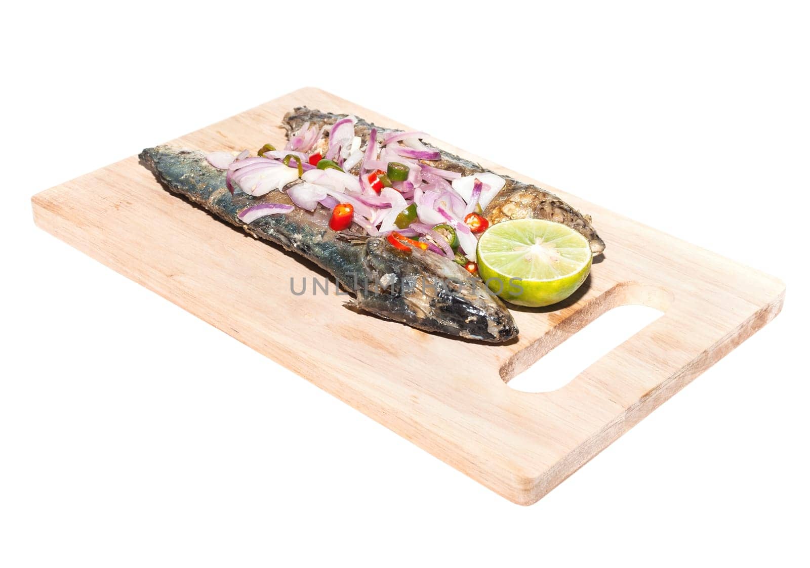 Salted fish on wooden plate isolated on white background