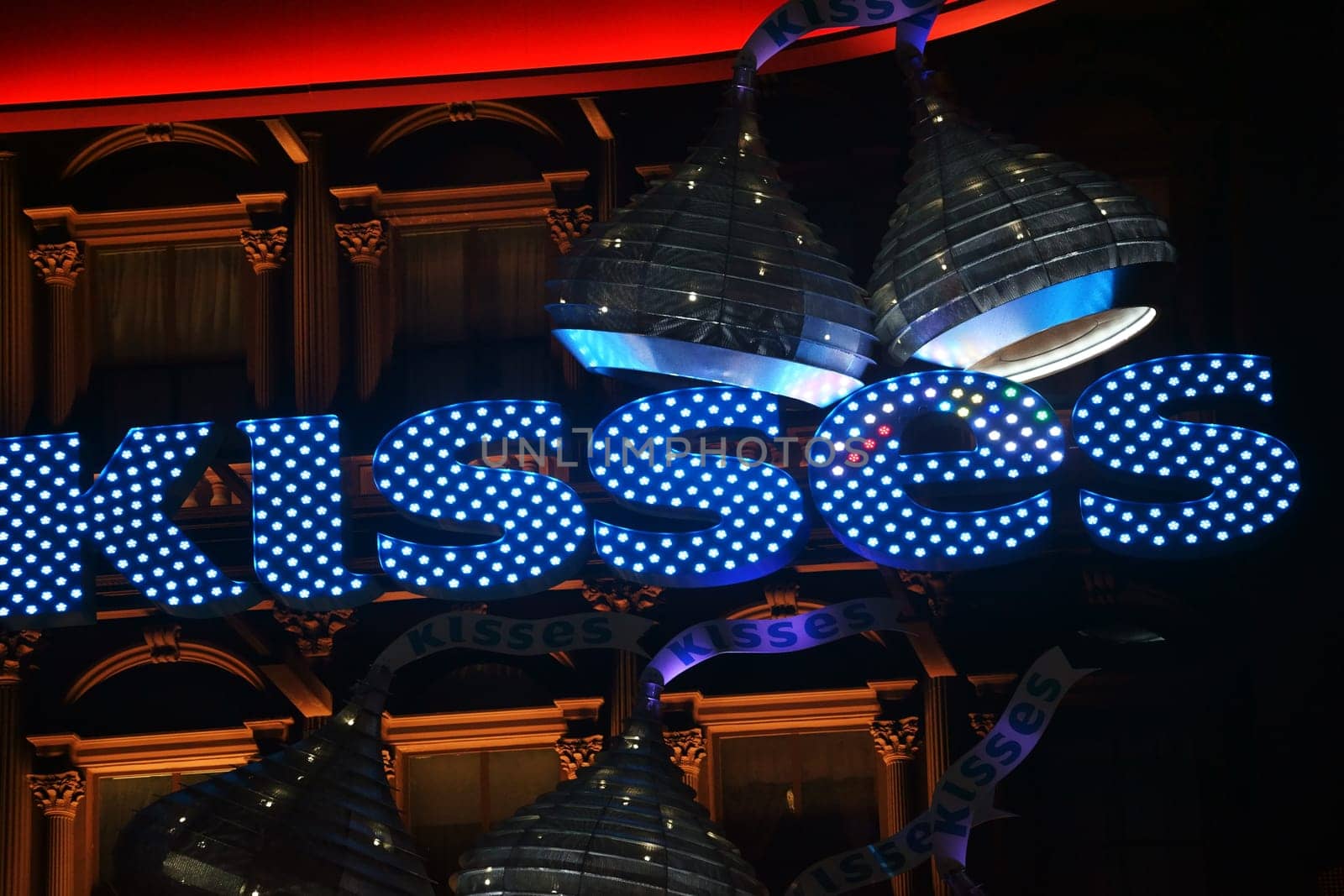 Las Vegas,United States - December 23,2015: The illuminated lettering of Kisses above the entrance of Hershey's chocolate world decorated with lamps and hoods on December 23,2015 in Las Vegas.