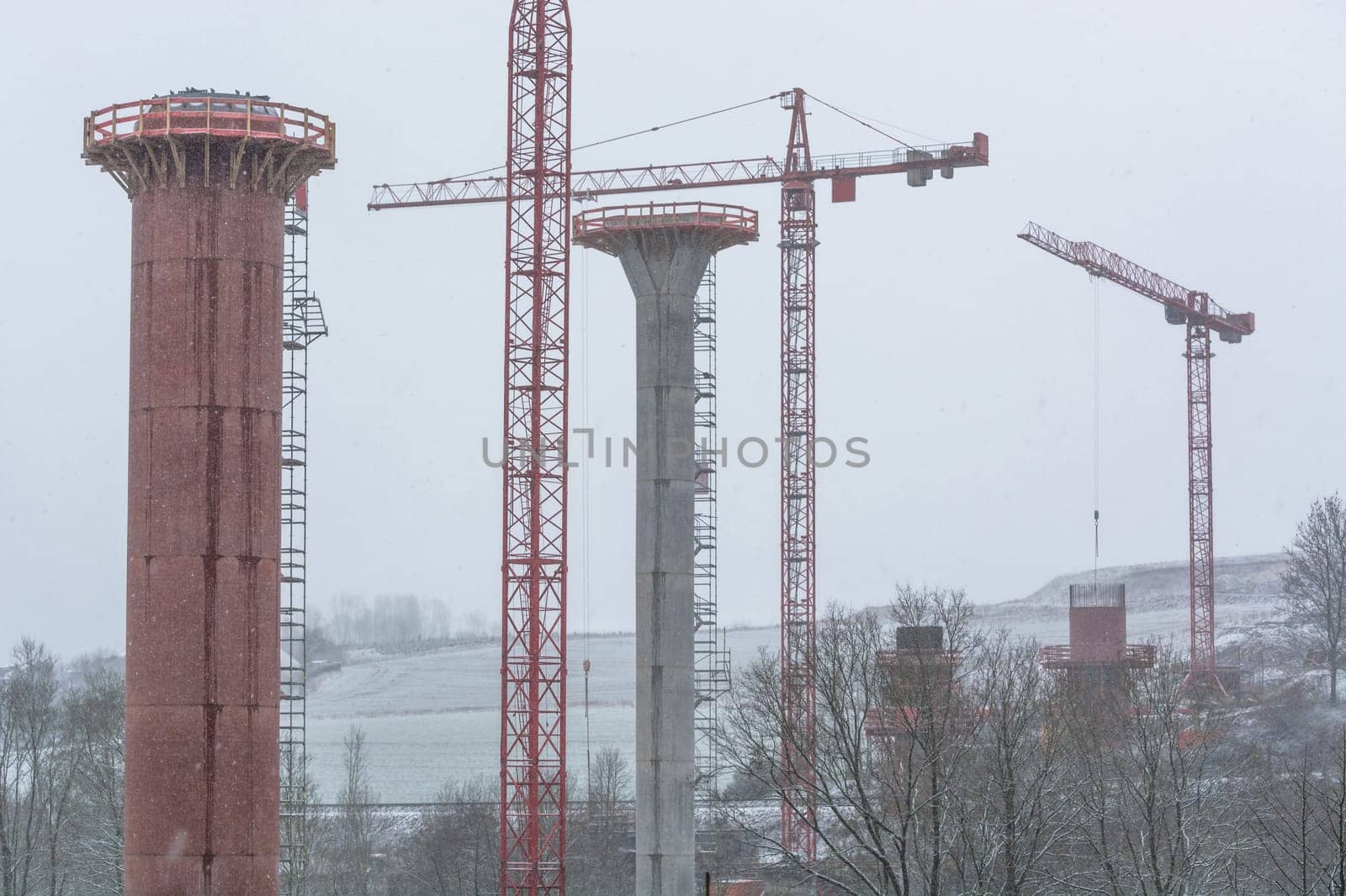Bridge construction site,bridge under construction seen from below during snow drifts. .