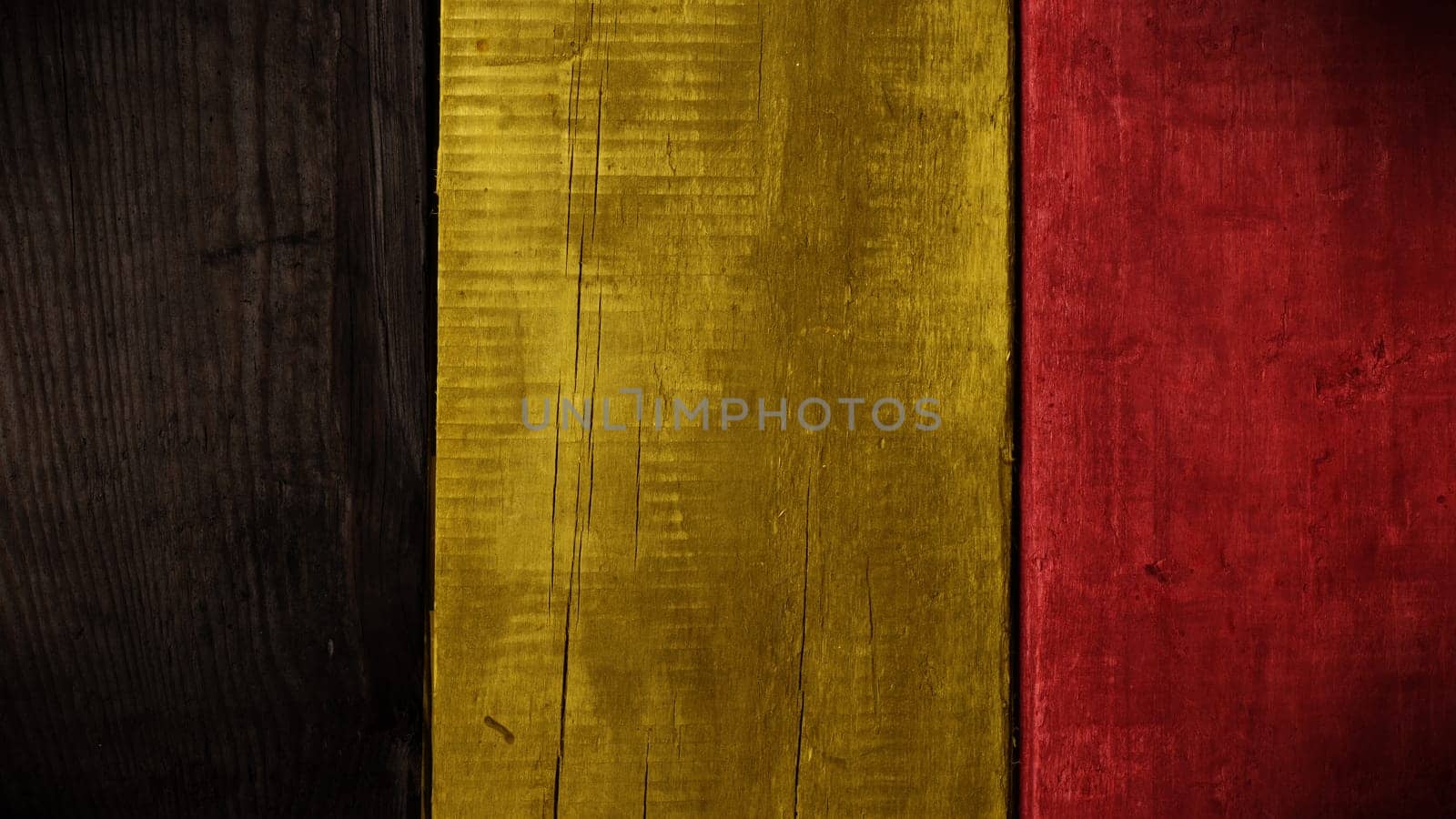 Wooden texture background with the colors of the Belgian flag