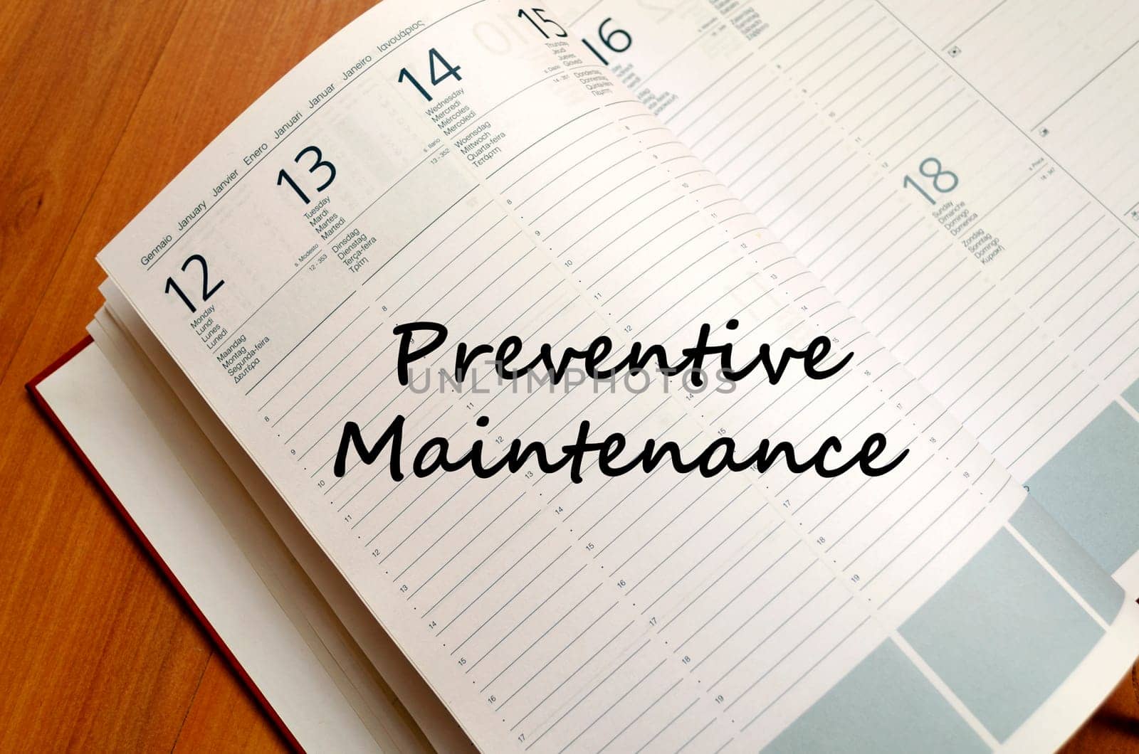Preventive maintenance text concept write on notebook with pen