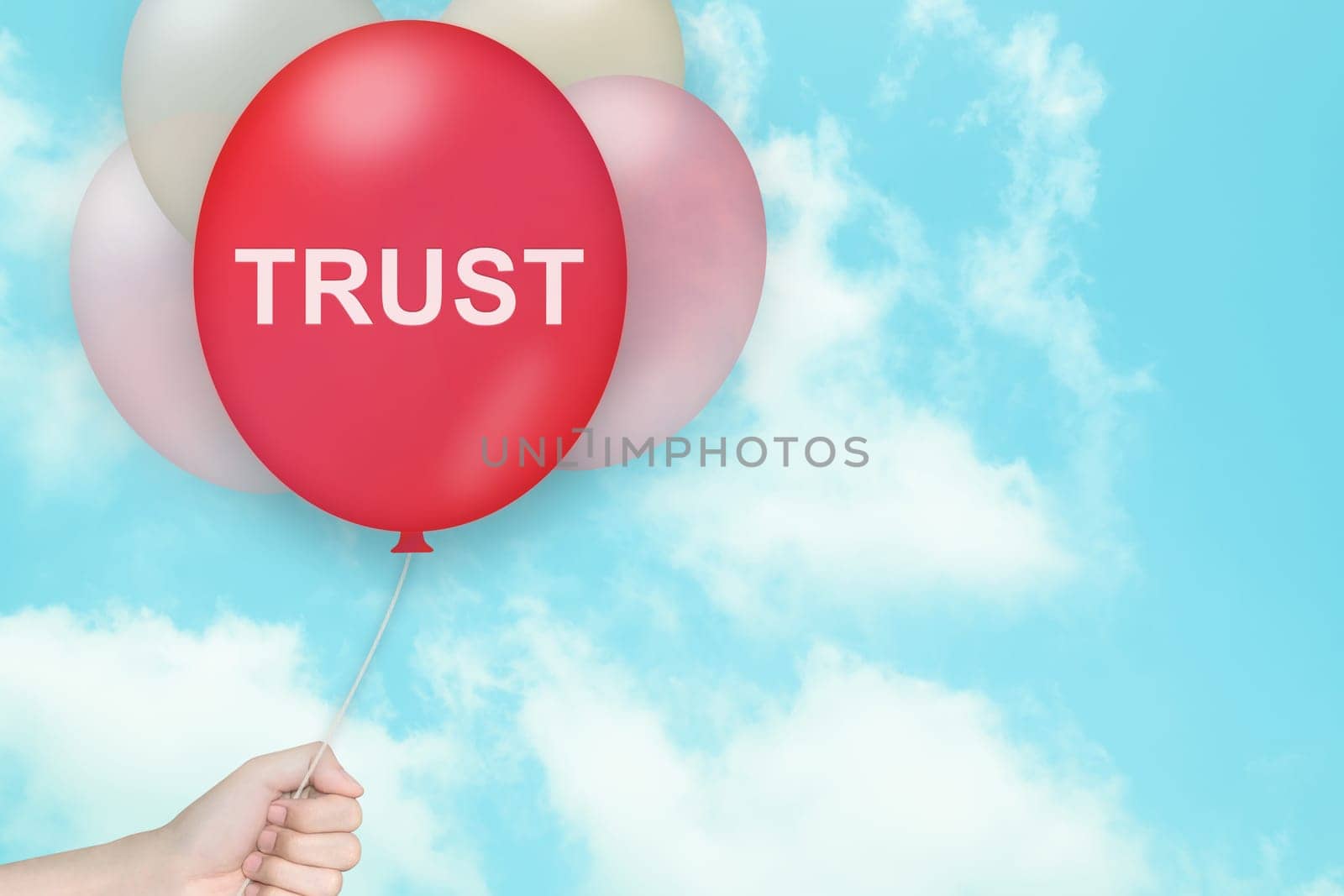 Hand Holding trust Balloon with blue sky and vintage style