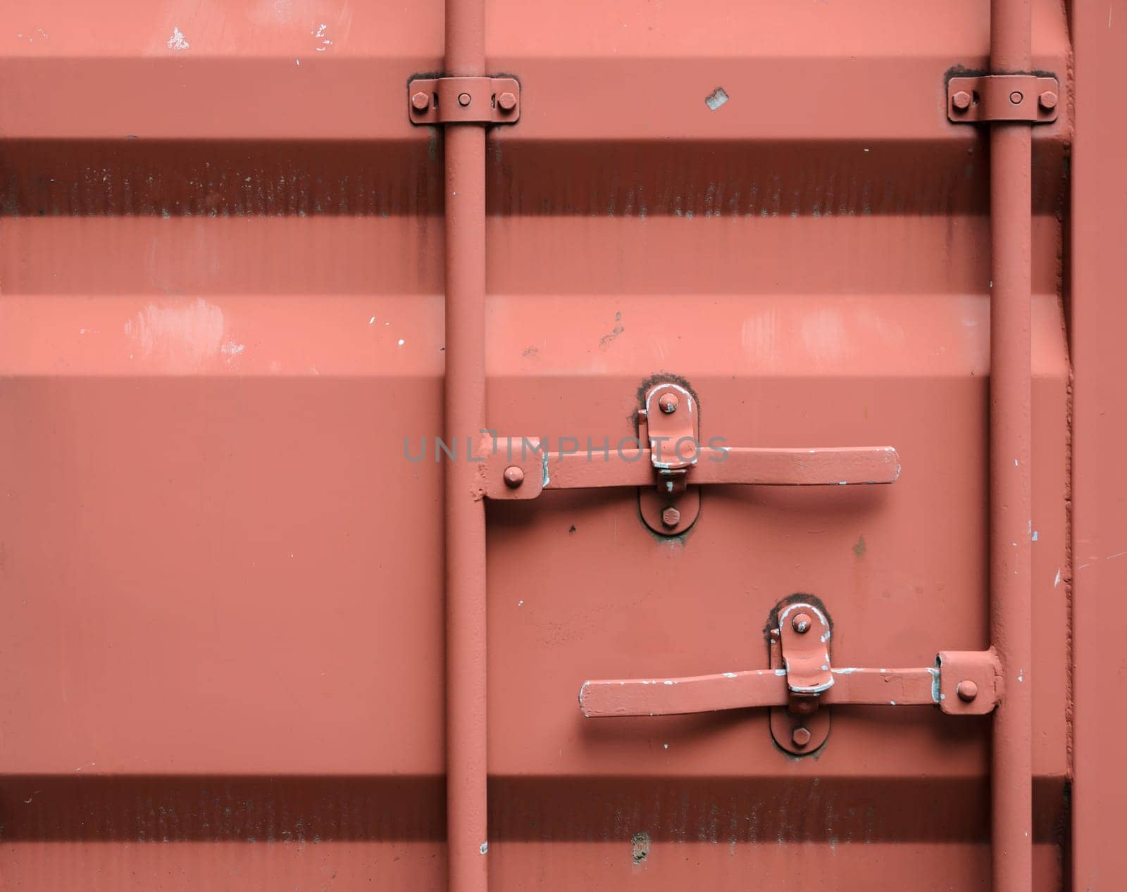 Red shipping container cargo background, close up of container back door locked