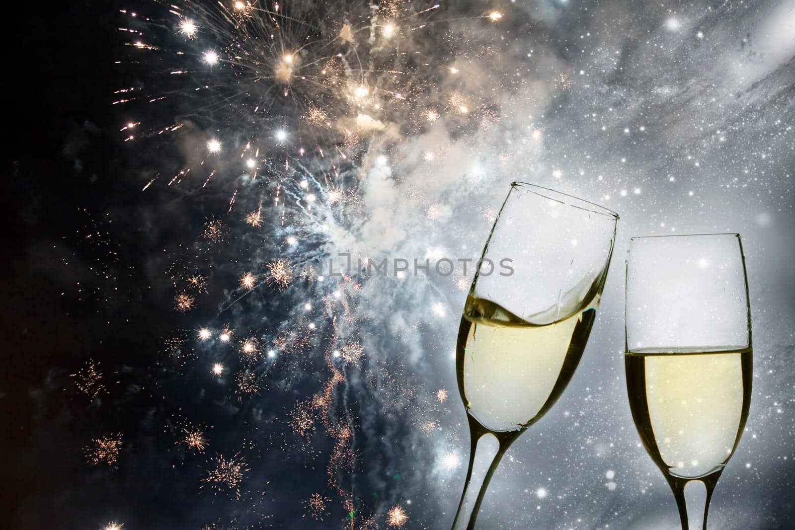 Champangne glasses on sparkling background